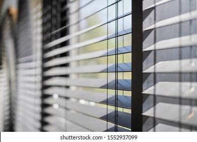 Office blinds. Modern wooden jalousie. Office meeting room lighting range control. - Shutterstock ID 1552937099