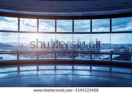 Office building glass and city skyline

