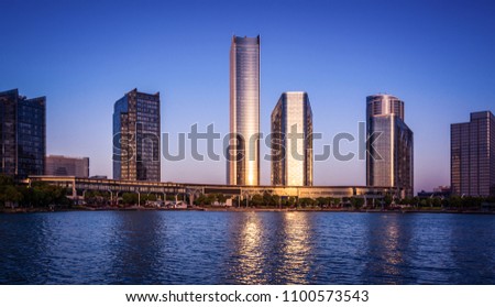 office building near the lake in sunset