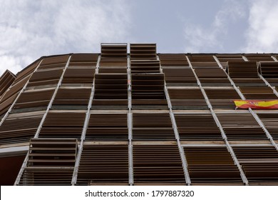 Office building with wooden windows seen from a low angle