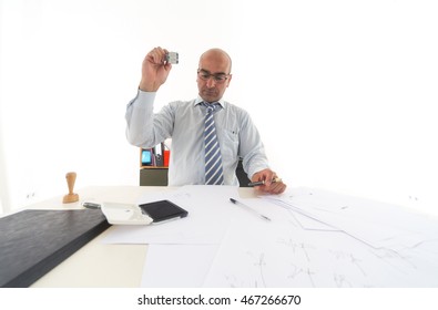 Office Bureaucrat Applying Stamps On Papers