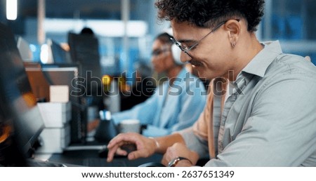 Office, businessman and typing with computer for programming, web development and smile. Coworking, night and male programmer with technology for professional coding, software update and information