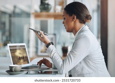 Office, businesswoman and speaker with phone call for communication, talking and chat with client. Career, female person and content writer with laptop for research, job and mobile app for voice note - Powered by Shutterstock