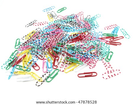 Similar – Colorful paper clips on a black board surface