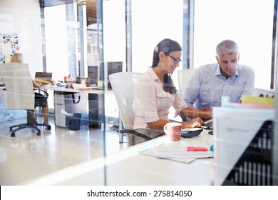 Office Colleagues Talking At Work