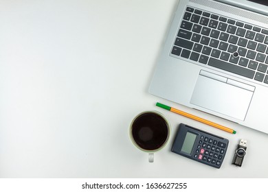 Office Concept. Layout Notebook, Fountain Pen, Calculator, Coffee Mug.