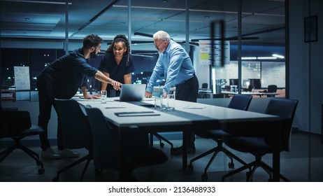 Office Conference Room Meeting: Diverse Team Of Top Managers Talk, Discuss, Brainstorm, Use Laptop Computer. Business Partners Presenting Investment And Marketing Strategy For E-Commerce Startup.