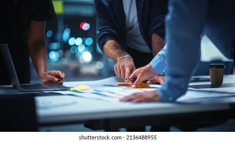 Office Conference Room Meeting: Diverse Team Of Top Managers Talk, Brainstorm, Use Digital Tablet. Business Partners Discuss Financial Reports, Plan Investment Strategy. Team Of Three