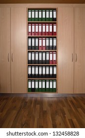 Office Cupboard With Different Folders, Wooden Floor