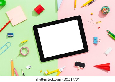 Office Desk With Blank Tablet. Young Student Table Fashion. Flat Lay.