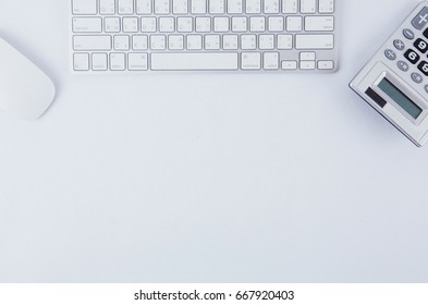 Office Desk And Calculator On White Clean Space