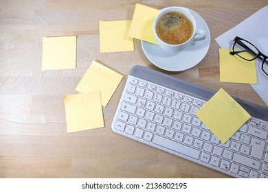 Office Desk With A Lot Of Empty Sticky Notes Or Post It, Computer Keyboard And Coffee Cup, Business At Home, Concept For Organization And Reminder, Copy Space, Top View From Above, Selected Focus