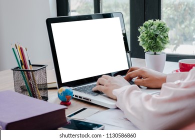 Office Desk Mockup Concept.Mockup Modern Desktop With Woman Hand Using Blank Screen Laptop Computer And A Lot Of Things On Desk.