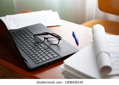 office desk a stack of computer paper reports work forms - Shutterstock ID 1308428143