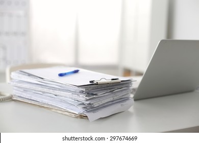 Office Desk A Stack Of Computer Paper Reports Work Forms