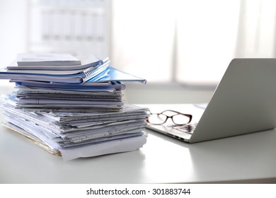 Office Desk A Stack Of Computer Paper Reports Work Forms