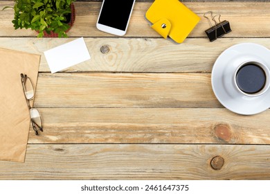 Office desk table with computer, pen and a cup of coffee, lot of things. Top view with copy space