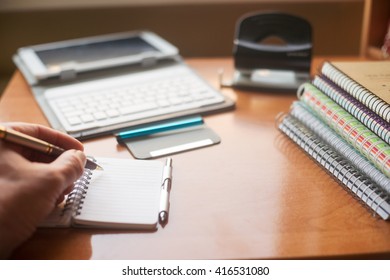 Office desk table with computer, supplies. Copy space for text.
