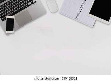 Office Desk Table With Computer, Supplies, Ipad,smartphone,coffee Cup On Wooden Background. Top View With Copy Space