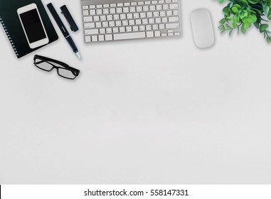 Office Desk Table With Computer, Supplies,analysis Chart, Ipad,smartphone,coffee Cup On Wooden Background. Top View With Copy Space