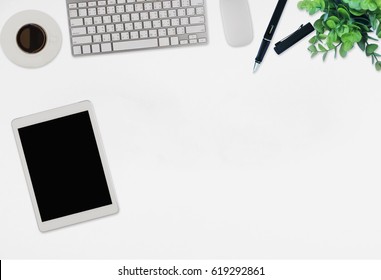 Office Desk Table With Computer, Supplies,analysis Chart, Ipad,smartphone,coffee Cup On Wooden Background. Top View With Copy Space