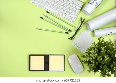 Office desk table with white computer, supplies. Top view with copy space