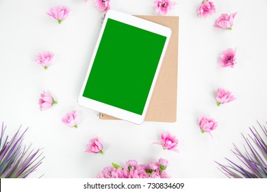 Office Desk Tablet Work Space Table Top View Overhead Above Show Tablet On Notebook Brown Around Flowers Pink So Beautiful Green Screen