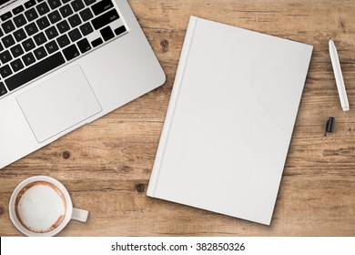 office desk top view with blank notebook - Shutterstock ID 382850326