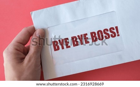 Office document in envelope with handwritten text BYE BYE BOSS, concept of quit job, farewell message to boss before leaving corporate job, the great resignation phenomenon