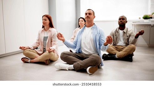 Office Employees Meditate In Yoga Class. Meditating To Calm Down - Powered by Shutterstock