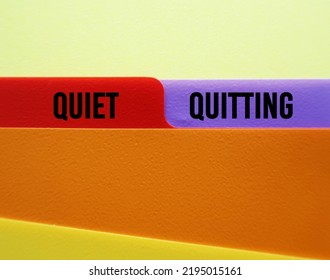 Office Folder With Text On Tag QUIET QUITTING, When Employees Not Engaged Or Taking Job Seriously, Do Minimum Required But Focus On Job Outside Office