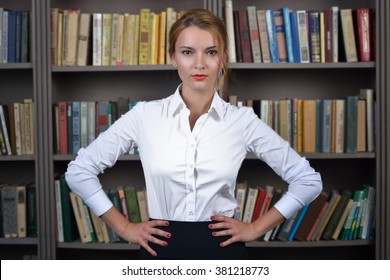 Office Girl Blondie In White Blouse In The Library