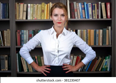 Office Girl Blondie In White Blouse In The Library