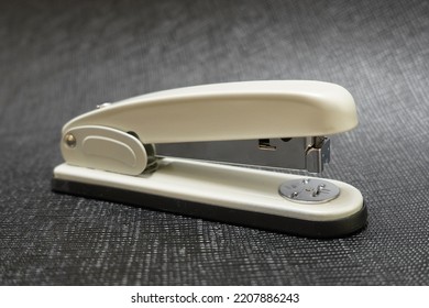 Office Gray Stapler Completely In Traditional Black Background