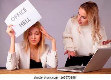 Office Hell. Conflict Between Female Colleagues. Portrait Of Beautiful Business Woman Going Crazy With Work In Office.