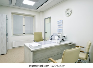 Doctor’s Office Interior In Clinic. Table And Equipment Inside Clean And Light Doctor’s Office. Empty Medical Consulting Room. Clinic And Healthcare Theme. Moscow - Dec 14, 2016