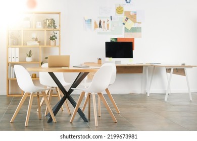 Office Interior Design, Workspace Building And Desk Table With Wood Chairs. Industrial Professional Room, Concrete Floor And White Wall Paint. Idea Style Storyboard, Modern Computer And Empty Decor