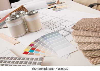 Office Of Interior Designer With Paint And Color Swatch On The Desk