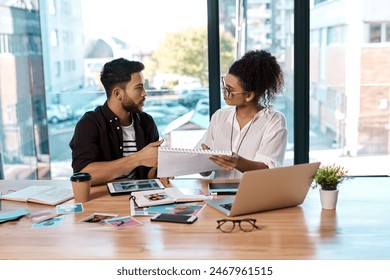 Office, laptop and colleagues with discussion, writing and together for collaboration of project online. Workplace, man and woman with teamwork, graphic designer and digital of photography and editor - Powered by Shutterstock