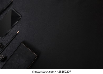 Office Leather Desk Table With Computer, Supplies And Smartphone. Top View With Copy Space. Office Business Table Overhead View
