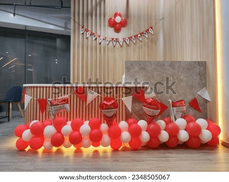 Office lobby decoration in order to Indonesia's independence day, 17 August. Dirgahayu RI means Independence Day of the Republic of Indonesia. Design with balloons and flag in red and white
