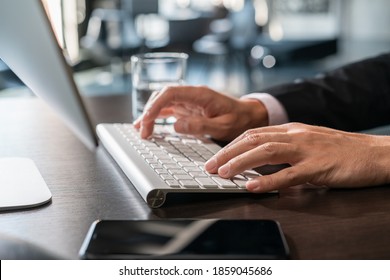 Office Manager Male Hands Typing On Computer Keyboard, Closeup. Businessman Working, Typing On The Wireless Keyboard, No Face, Concept Of Work