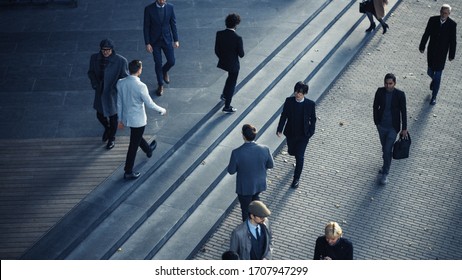 Office Managers And Business People Commute To Work In The Morning Or From Office On A Sunny Day On Foot. Pedestrians Are Dressed Smartly. Successful People Walking In Downtown. Shot From Above.