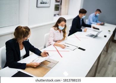 Office Meeting At Work With Social Distancing 