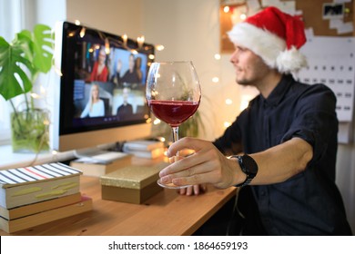 Office New Year Conference Party Online Meeting With Friends And Family. Christmas Holiday Eve In 2021. Parties During Quarantine Distance Celebration. Video Conferencing Happy Hour. Man And Hat