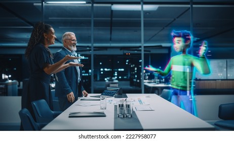 Office Online Meeting Video Conference Call: Businesspeople Connect to Augmented Reality Metaverse, Talk to Digital Avatar of Colleague at Remote Job. e-Business For Virtual Work. Hologram Concept. - Powered by Shutterstock