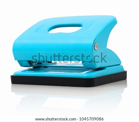 Office paper perforator isolated on white background with shadow reflection.  Office tool that is used to create holes in sheets of paper. Paper Metal Stationary Hole Puncher. Office file-punch