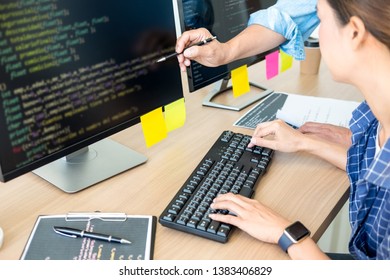IT office Programmers software development coding technologies On Computer working in a company office.