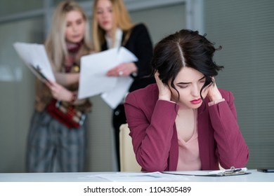 Office Rush And Buzz. Tired Woman In Busy And Noisy Workspace Can't Concentrate On Work