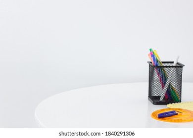 Office and school supplies on white background.